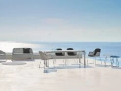 Cane-line Breeze Korkeaselkänojaisen Tuolin Tyynysetti, Musta 9 Cane-line Breeze Korkeaselkänojaisen Tuolin Tyynysetti, Musta -Puutarha Unelma Breeze chair white Edge table concrete on the move Kingston sofa 1